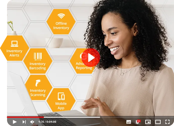 Woman managing inventory with Wasp Inventory management software